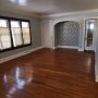 entry door on left and closet on right in living room