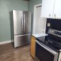 kitchen appliances and side entry door.