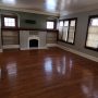 view of decorative fireplace and large mantle in living room