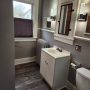 bathroom vanity sink and medicine cabinet with sconces