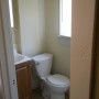 First floor half bathroom off of kitchen