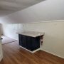 cabinet and counter in kitchen area