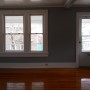 view of storm screen door at front porch in living room